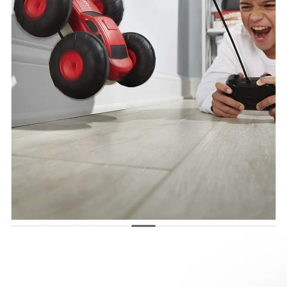 Sharper Image Red and Black Remote Control Stunt Car
